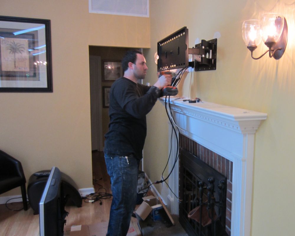 https://daveburroughs.com/wp-content/uploads/2022/12/how-to-hide-tv-wires-over-fireplace-4.jpg